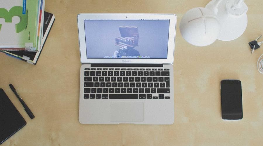 Person and screen working together in a balanced workflow